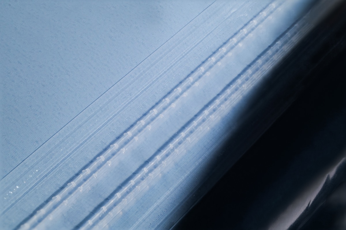 Calyx Cure dual-track zipper closure system