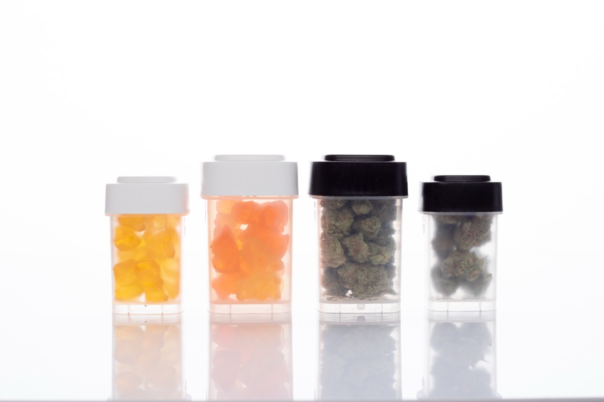 Calyx containers with flower and edible products