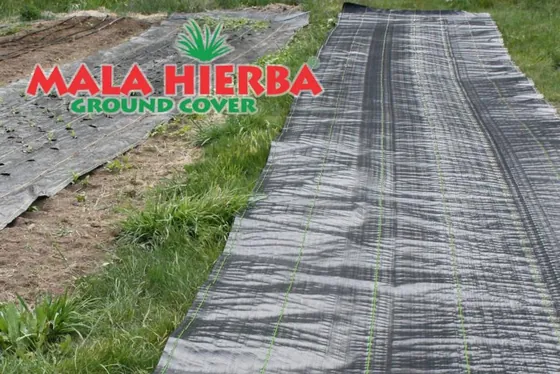 Barrera contra maleza MALAHIERBA como cobertura de suelo a lo largo de una hilera
